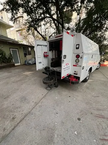 Magnet Plumbing service vehicle on-site for Water Heater Repair in Cisco Gardens